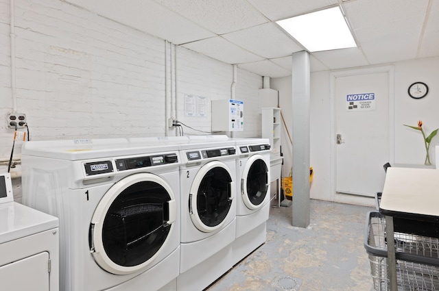 common laundry area with washer and dryer