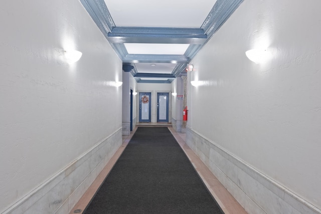 hallway featuring crown molding