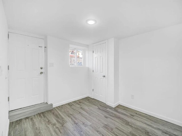 21 Freedom Pl, Jersey City, NJ 07065 - foyer featuring wood finished floors and baseboards