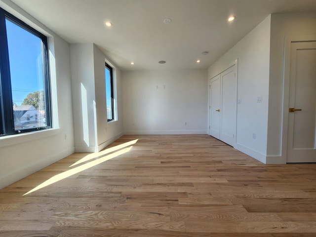 unfurnished bedroom featuring light hardwood / wood-style floors