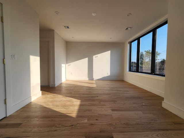 empty room with light wood-type flooring