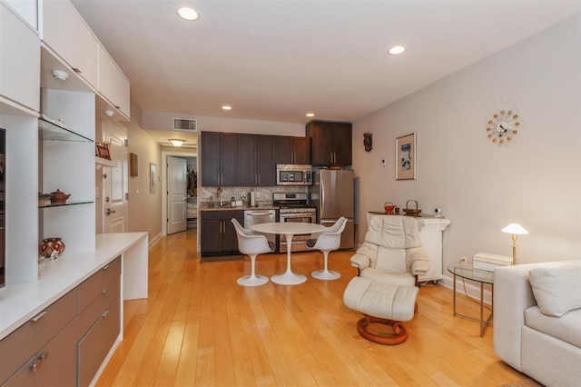 112 Liberty View Dr Unit 2A, Jersey City, NJ 07302 - living area with light wood-style floors and recessed lighting