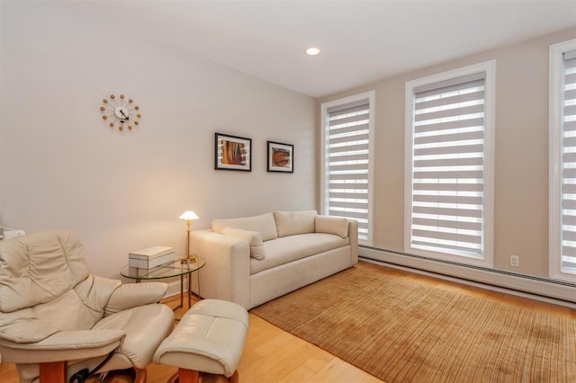 112 Liberty View Dr Unit 2A, Jersey City, NJ 07302 - living area featuring baseboard heating, wood finished floors, and recessed lighting