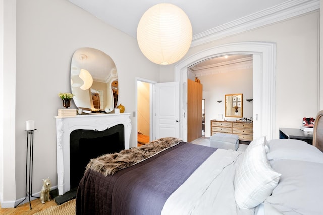 233 Summit Ave, Jersey City, NJ 07304 - bedroom with ornamental molding and light wood-style floors