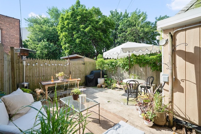 233 Summit Ave, Jersey City, NJ 07304 - fenced backyard featuring a patio and outdoor dining space