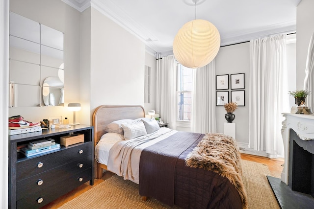 233 Summit Ave, Jersey City, NJ 07304 - bedroom featuring crown molding and light wood-type flooring