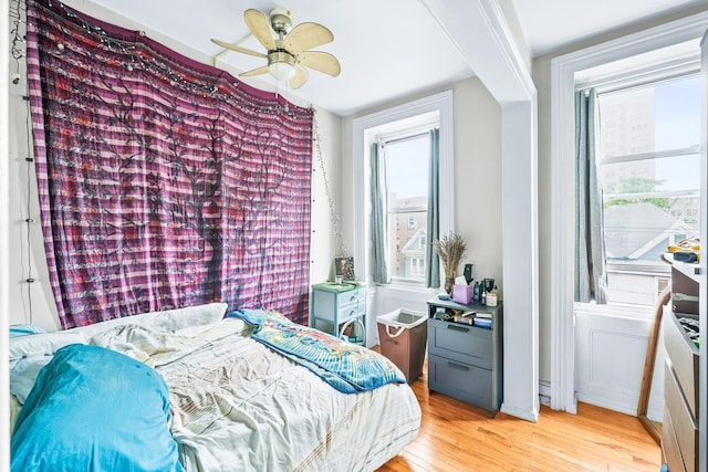 233 Summit Ave, Jersey City, NJ 07304 - bedroom featuring light wood-type flooring and a ceiling fan