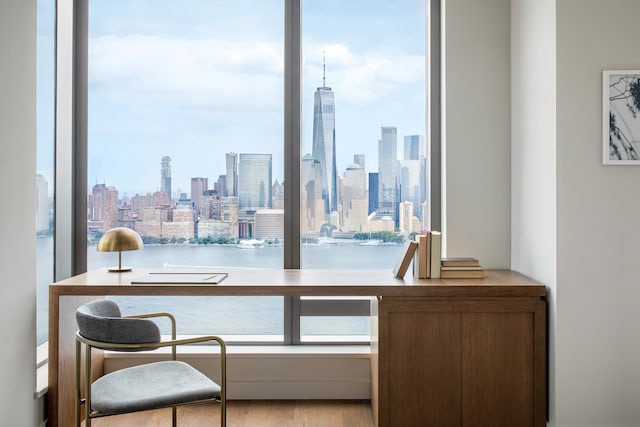 99 Hudson St Unit 3708, Jersey City, NJ 07302 - home office featuring a view of city and wood finished floors