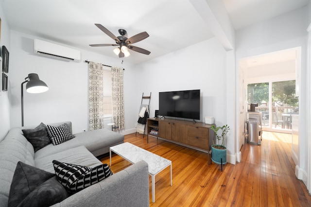 34 Romaine Ave Unit 2, Jersey City, NJ 07306 - living area with a wall mounted air conditioner, a ceiling fan, and hardwood / wood-style flooring