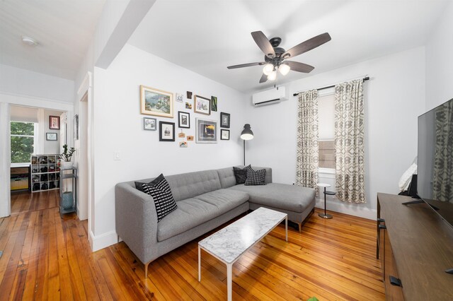 34 Romaine Ave Unit 2, Jersey City, NJ 07306 - living room featuring an AC wall unit, ceiling fan, and light wood-type flooring