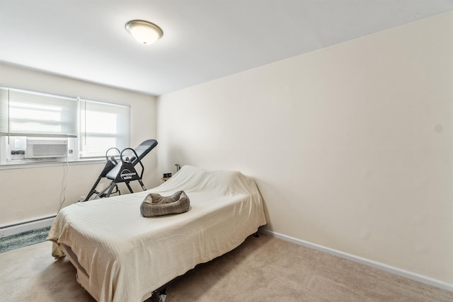 bedroom featuring cooling unit, baseboards, carpet, and a baseboard radiator