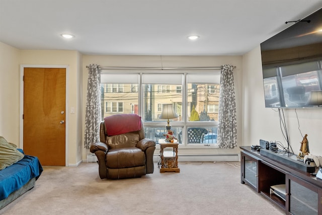 sitting room with recessed lighting, a baseboard radiator, carpet, and baseboard heating