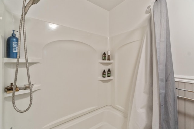 bathroom with a shower with curtain