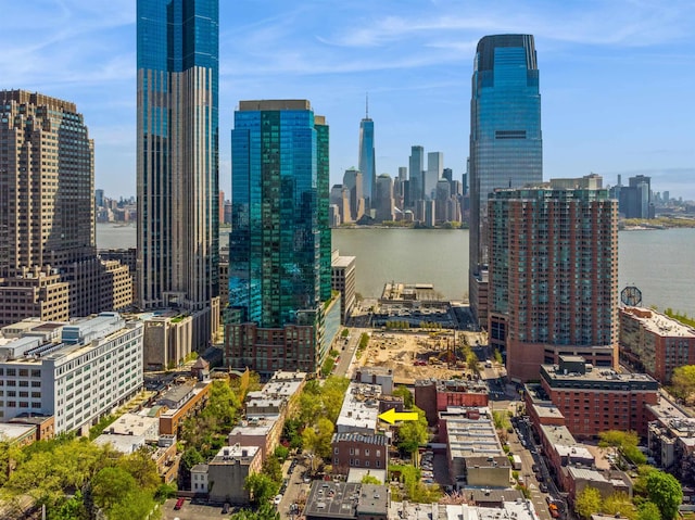 property's view of city with a water view