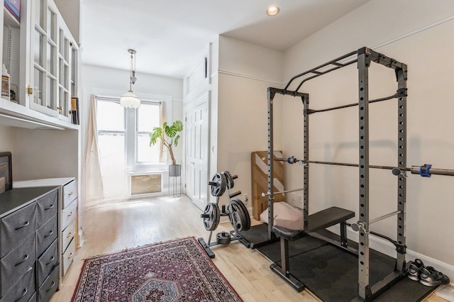 workout room with light wood-type flooring