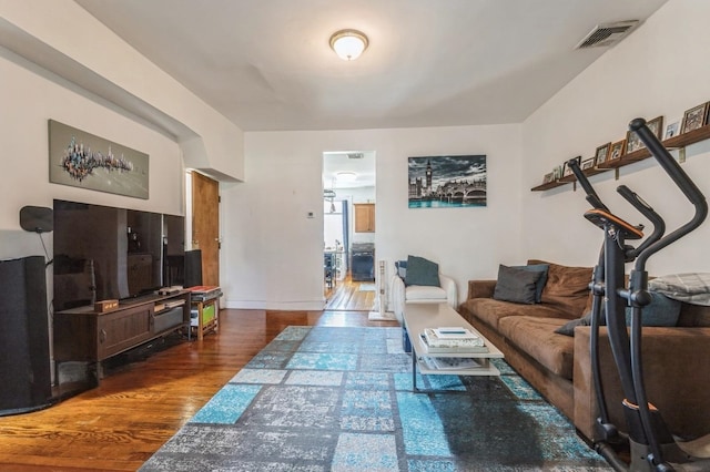 living room featuring dark hardwood / wood-style flooring