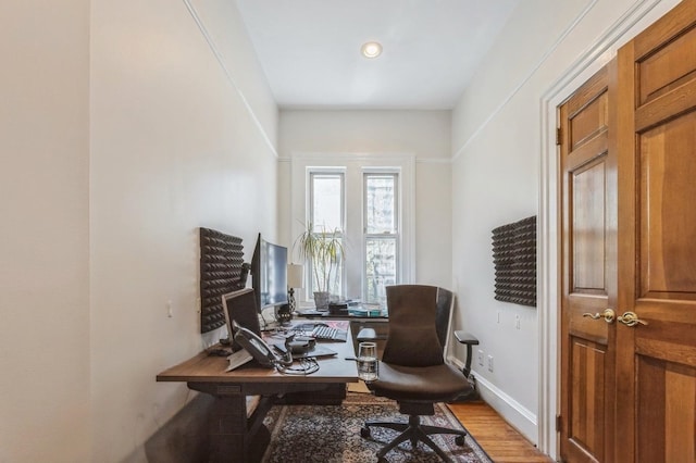 office area with light hardwood / wood-style flooring