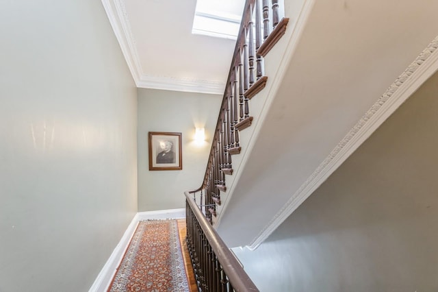 staircase with crown molding