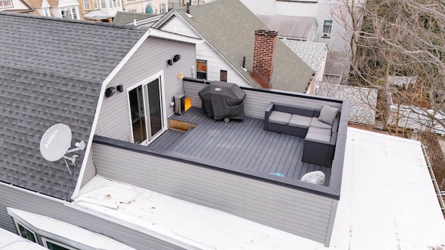 wooden deck featuring area for grilling