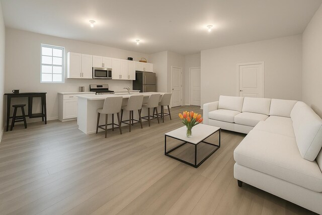 512 Monastery Pl, Union City, NJ 07087 - living room featuring baseboards and light wood-style floors