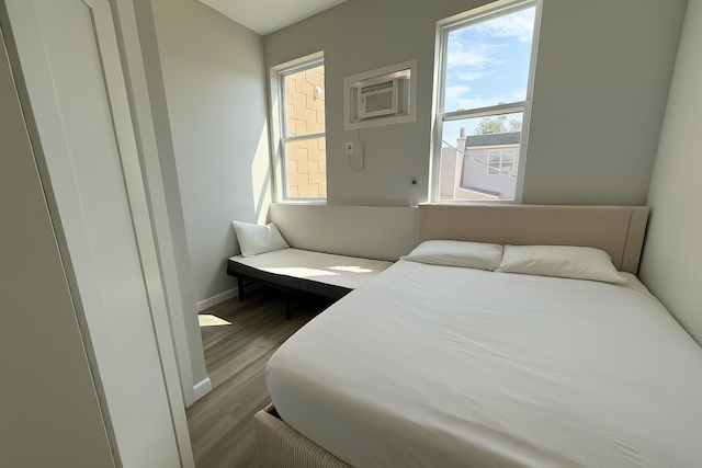 512 Monastery Pl, Union City, NJ 07087 - bedroom featuring wood finished floors and a wall mounted AC