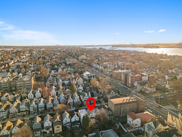 aerial view featuring a residential view and a water view