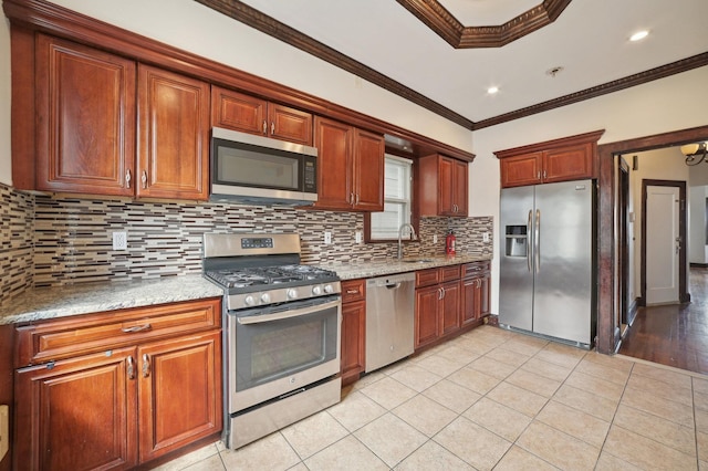 2105 Palisade Ave, Union City, NJ 07087 - kitchen featuring stainless steel appliances, crown molding, tasteful backsplash, a sink, and light tile patterned floors