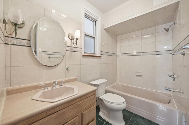 2105 Palisade Ave, Union City, NJ 07087 - bathroom featuring tile walls, vanity, toilet,  shower combination, and tile patterned flooring