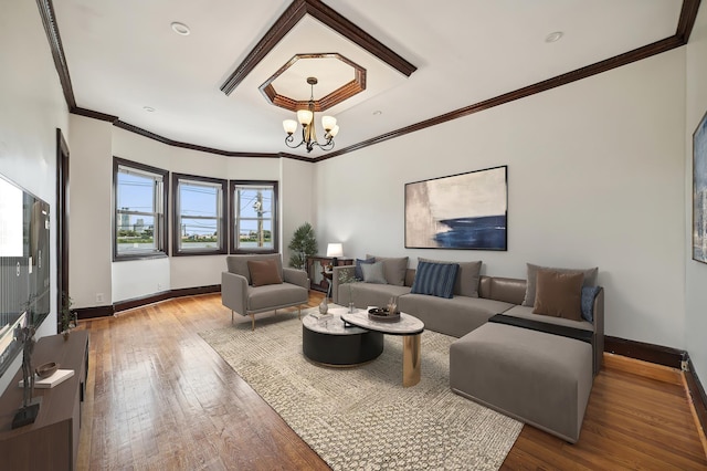 2105 Palisade Ave, Union City, NJ 07087 - living area featuring hardwood / wood-style flooring, a chandelier, baseboards, and ornamental molding