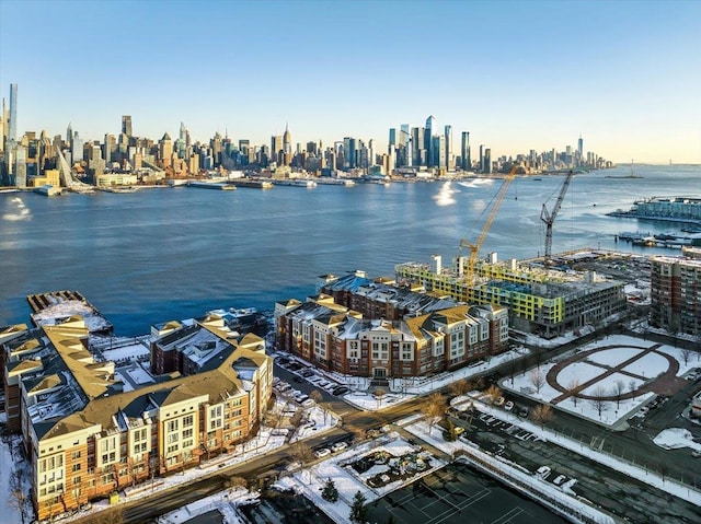 bird's eye view with a water view and a city view