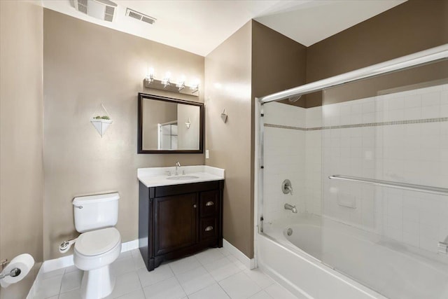 full bathroom with washtub / shower combination, baseboards, toilet, and tile patterned floors