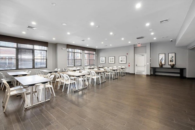 dining area with visible vents, wood finished floors, and recessed lighting