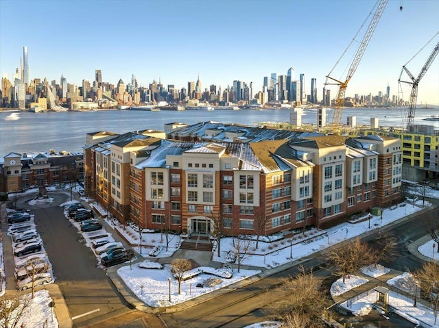 birds eye view of property featuring a view of city