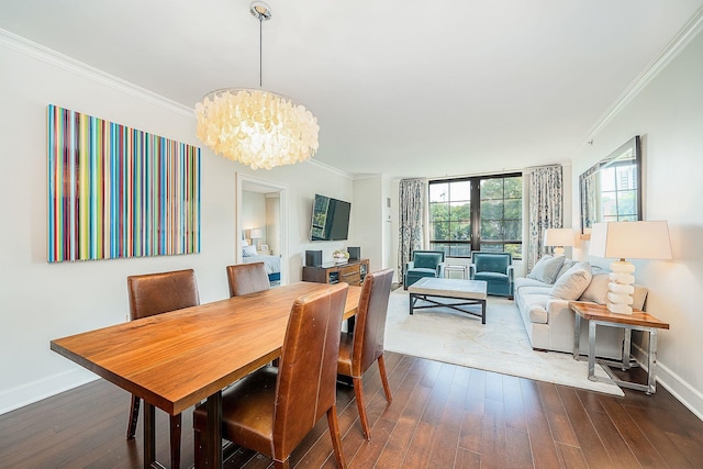 1025 Maxwell Ln Unit 304, Hoboken, NJ 07030 - dining room featuring an inviting chandelier, ornamental molding, baseboards, and dark wood-style flooring