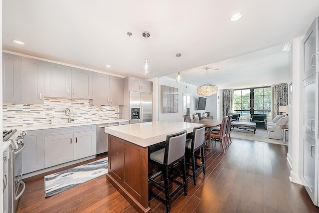 1025 Maxwell Ln Unit 304, Hoboken, NJ 07030 - kitchen featuring a sink, appliances with stainless steel finishes, dark wood-style floors, and light countertops