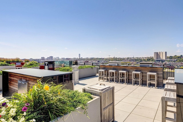 1025 Maxwell Ln Unit 304, Hoboken, NJ 07030 - view of patio featuring outdoor dry bar and a city view