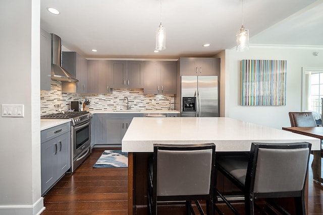 1025 Maxwell Ln Unit 304, Hoboken, NJ 07030 - kitchen with wall chimney range hood, a sink, light countertops, stainless steel appliances, and gray cabinetry