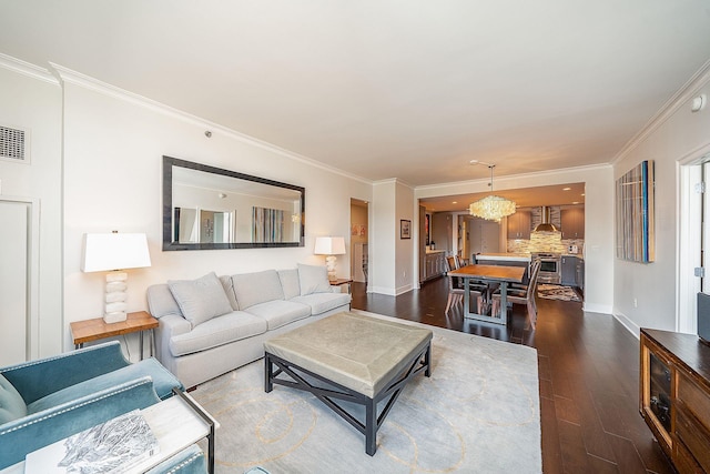 1025 Maxwell Ln Unit 304, Hoboken, NJ 07030 - living room with visible vents, ornamental molding, baseboards, dark wood-type flooring, and a chandelier