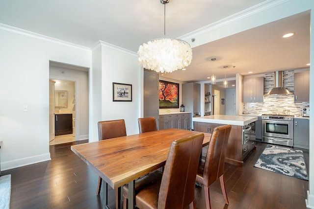 1025 Maxwell Ln Unit 304, Hoboken, NJ 07030 - dining room featuring crown molding, baseboards, dark wood-style flooring, and a notable chandelier