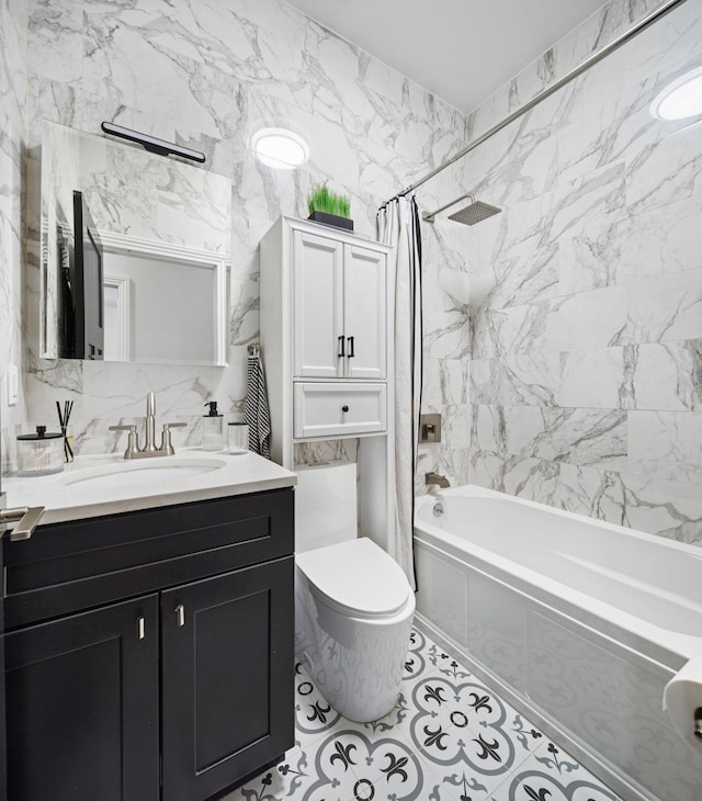 full bathroom with tile walls, toilet, vanity, and shower / bathtub combination with curtain