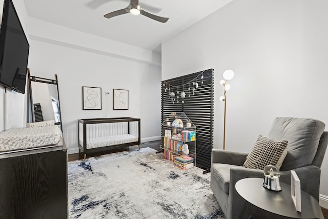 bedroom featuring ceiling fan and wood-type flooring