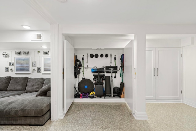 workout room featuring carpet