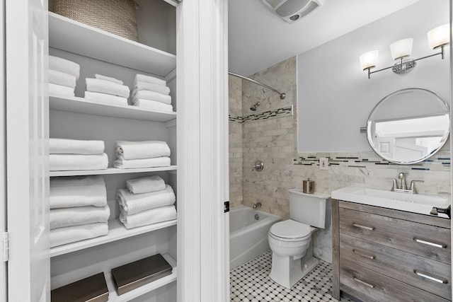 264 9th St Unit 2R, Jersey City, NJ 07302 - bathroom with toilet, vanity, shower / bath combination, and tile patterned floors