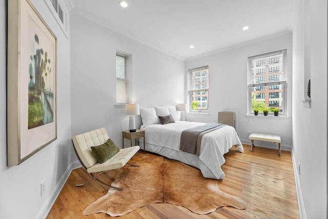 264 9th St Unit 2R, Jersey City, NJ 07302 - bedroom with crown molding, baseboards, wood finished floors, and recessed lighting