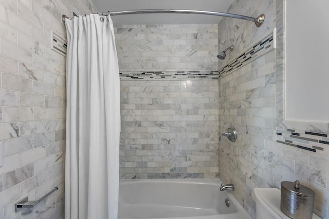 264 9th St Unit 2R, Jersey City, NJ 07302 - bathroom featuring shower / bath combo with shower curtain and tile walls