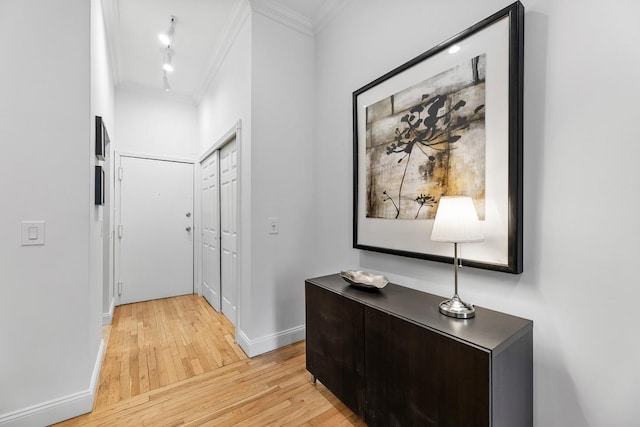 264 9th St Unit 2R, Jersey City, NJ 07302 - hallway with ornamental molding, light wood-type flooring, and baseboards