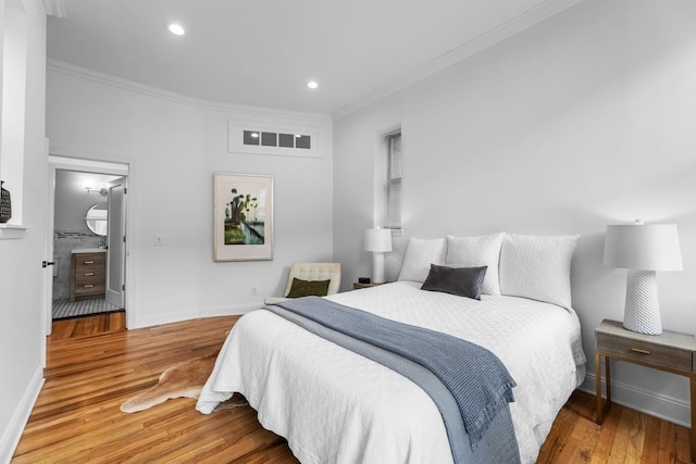264 9th St Unit 2R, Jersey City, NJ 07302 - bedroom with crown molding, wood finished floors, baseboards, and recessed lighting