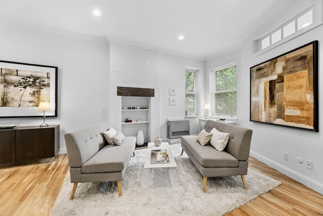 264 9th St Unit 2R, Jersey City, NJ 07302 - living room featuring ornamental molding, light wood-style floors, baseboards, and recessed lighting