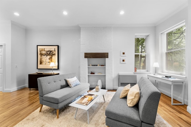 264 9th St Unit 2R, Jersey City, NJ 07302 - living area featuring wood finished floors, crown molding, recessed lighting, and baseboards