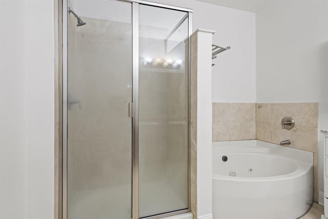 20 Avenue At Port Imperial Unit 102, West New York, NJ 07093 - bathroom featuring a stall shower and a jetted tub
